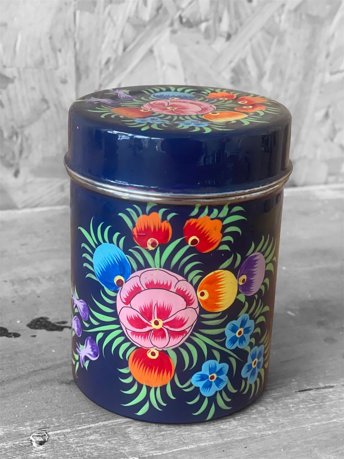 Handpainted dark blue with floral design